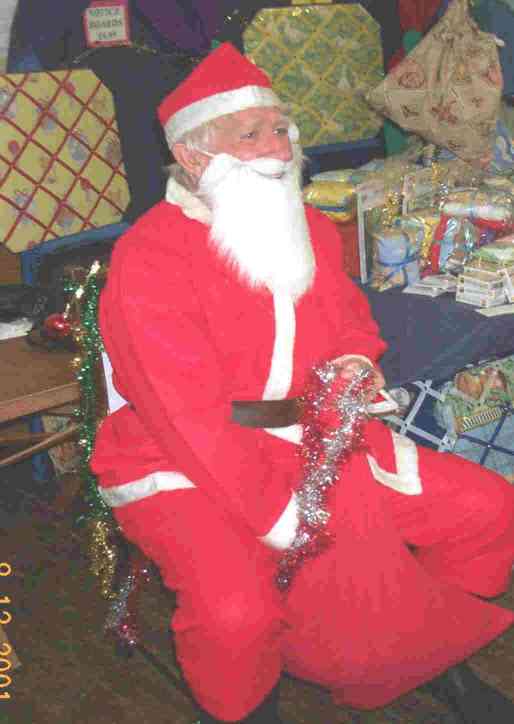 Tom Fisher as santa in Dec 2001