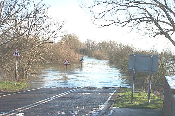 the flooded A1101 Wash road